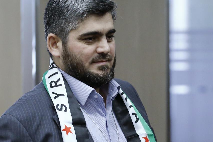 hnc-negotiator-mohammed-alloush-arrives-geneva.